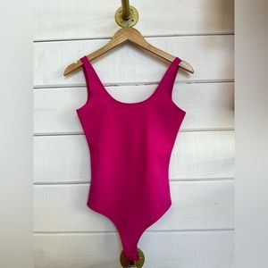 Hot pink body suit, with snap bottom! Thick material, one of our best sellers!